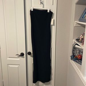 Black bodycon dress with slit